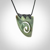 Hand carved contemporary jade koru jewellery. Made by Donna Summers for NZ Pacific from New Zealand greenstone.